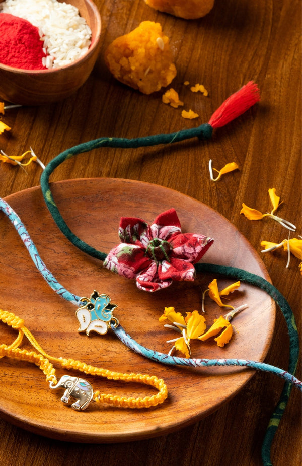 <strong>Sustainable Cloth Rakhi Combo<br>Ganesh + Phool + Hathi</strong> <br><i>with Roli & Akshat</i> - Nat Habit