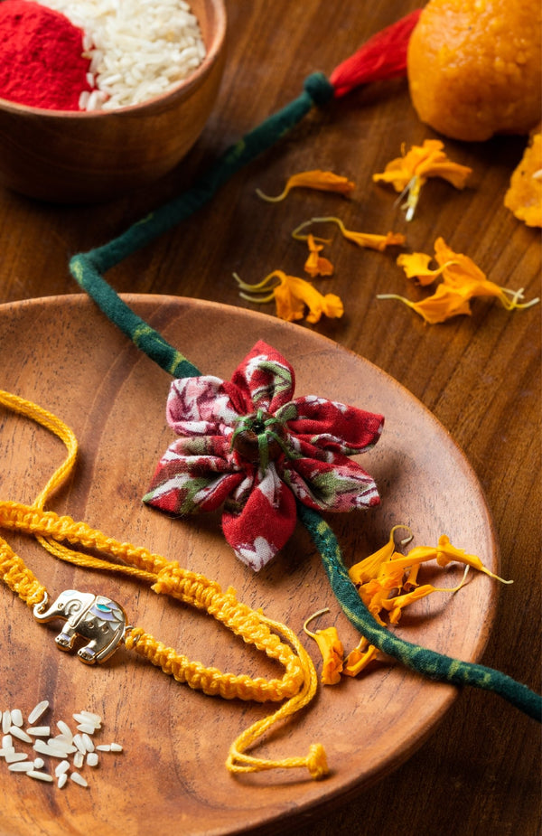 <strong>Sustainable Cloth Rakhi Combo<br>Hathi + Phool</strong> <br><i>with Roli & Akshat</i> - Nat Habit